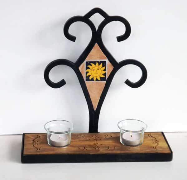 Wrought Iron wall sconce with sun & shelf
